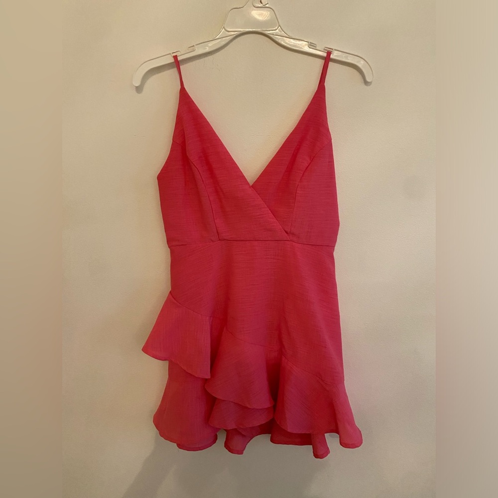 Hot pink romper from the clothing company. Size small. Asking $30.